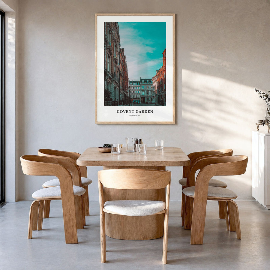 Covent Garden Classic Poster in a natural wood frame, hanging in a dining room