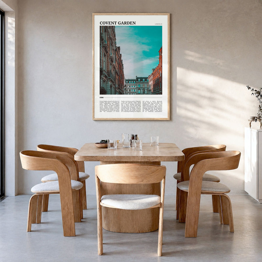 Covent Garden Travel Poster in a natural wood frame, hanging in a dining room