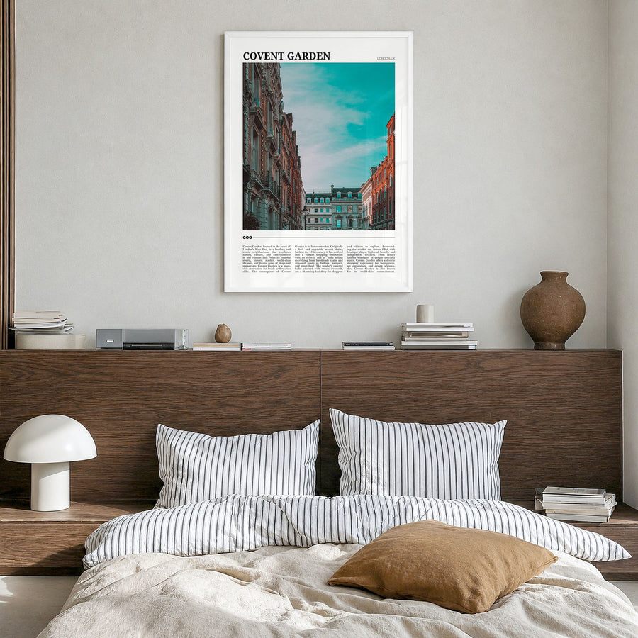 Covent Garden Travel Poster in a white wood frame, hanging in a bedroom
