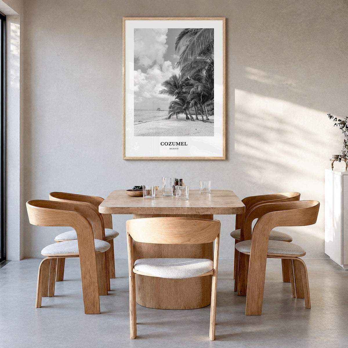 Cozumel Classic Poster in a natural wood frame, hanging in a dining room