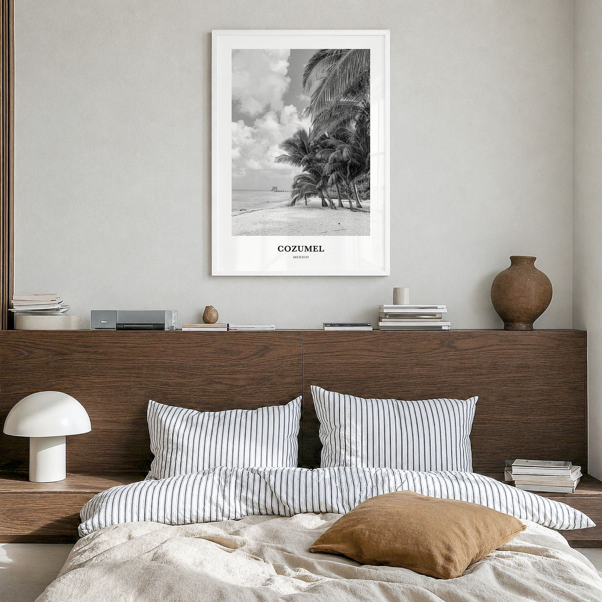 Cozumel Classic Poster in a white wood frame, hanging in a bedroom