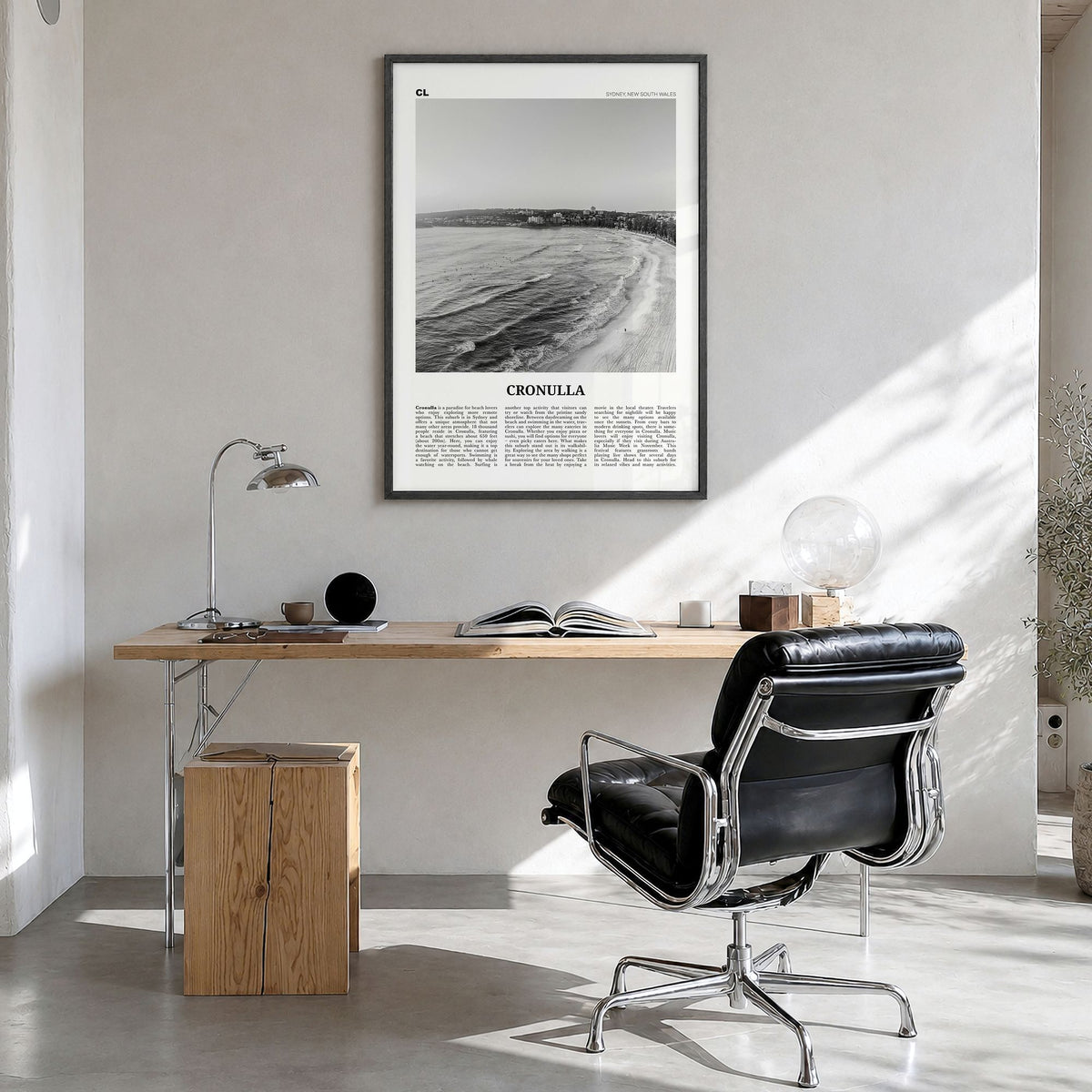 Cronulla Newspaper Poster in a black wood frame, hanging in a bright home office