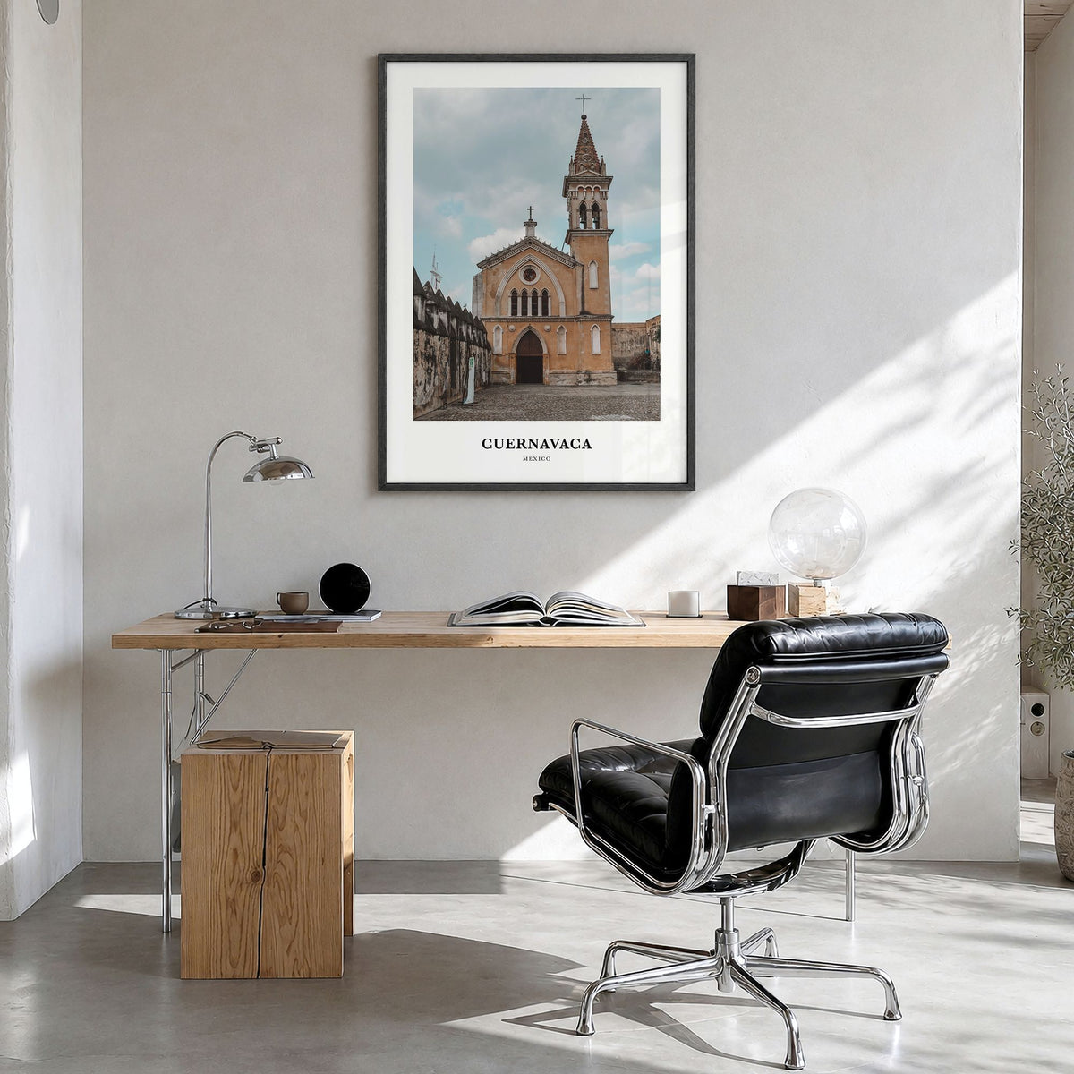 Cuernavaca Classic Poster in a black wood frame, hanging in a bright home office