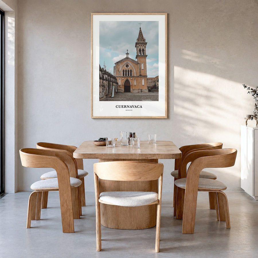 Cuernavaca Classic Poster in a natural wood frame, hanging in a dining room