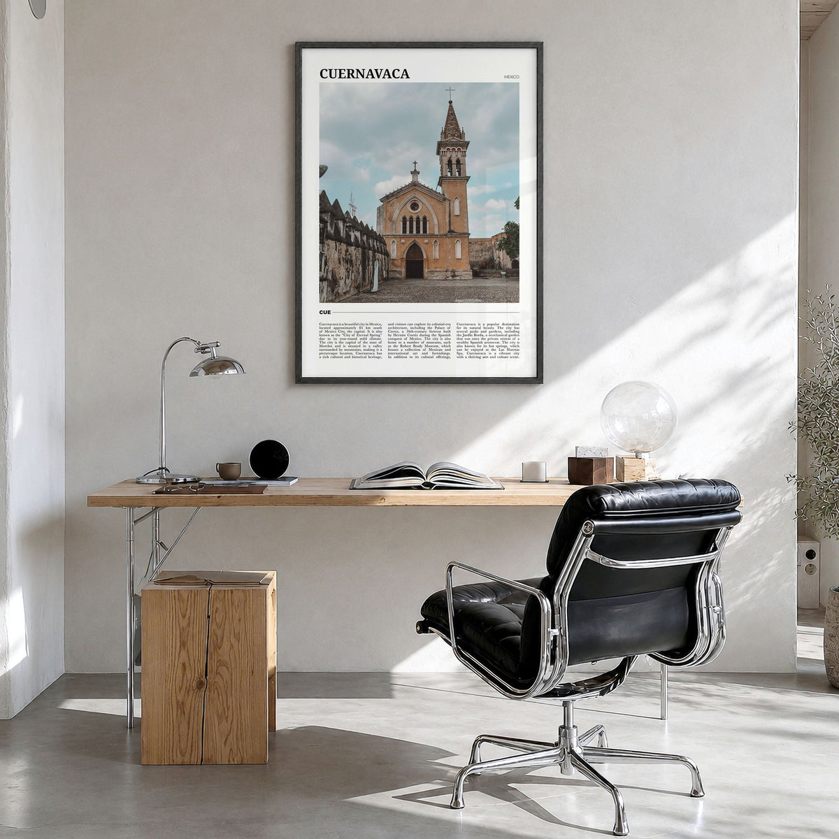 Cuernavaca Travel Poster in a black wood frame, hanging in a bright home office