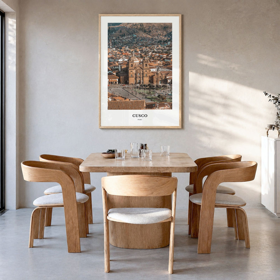 Cusco Classic Poster in a natural wood frame, hanging in a dining room