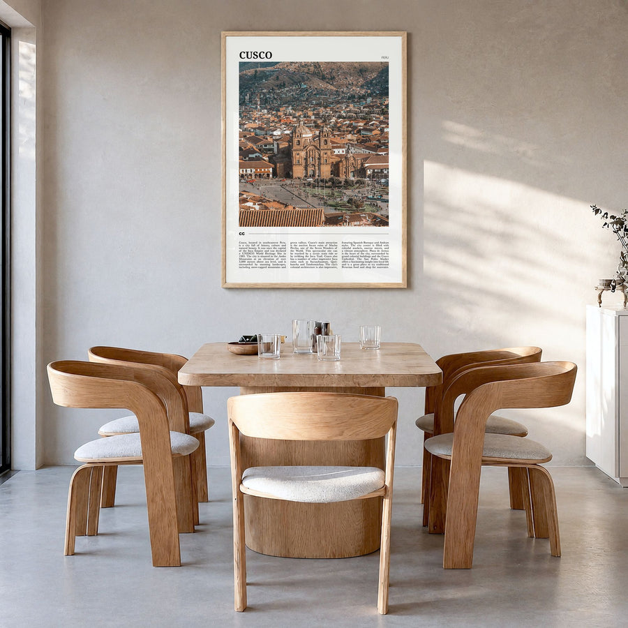 Cusco Travel Poster in a natural wood frame, hanging in a dining room