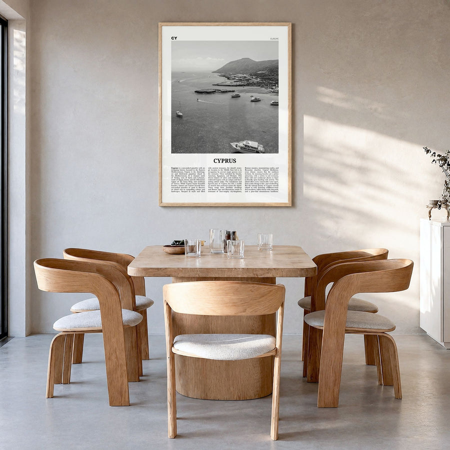Cyprus Newspaper Poster in a natural wood frame, hanging in a dining room