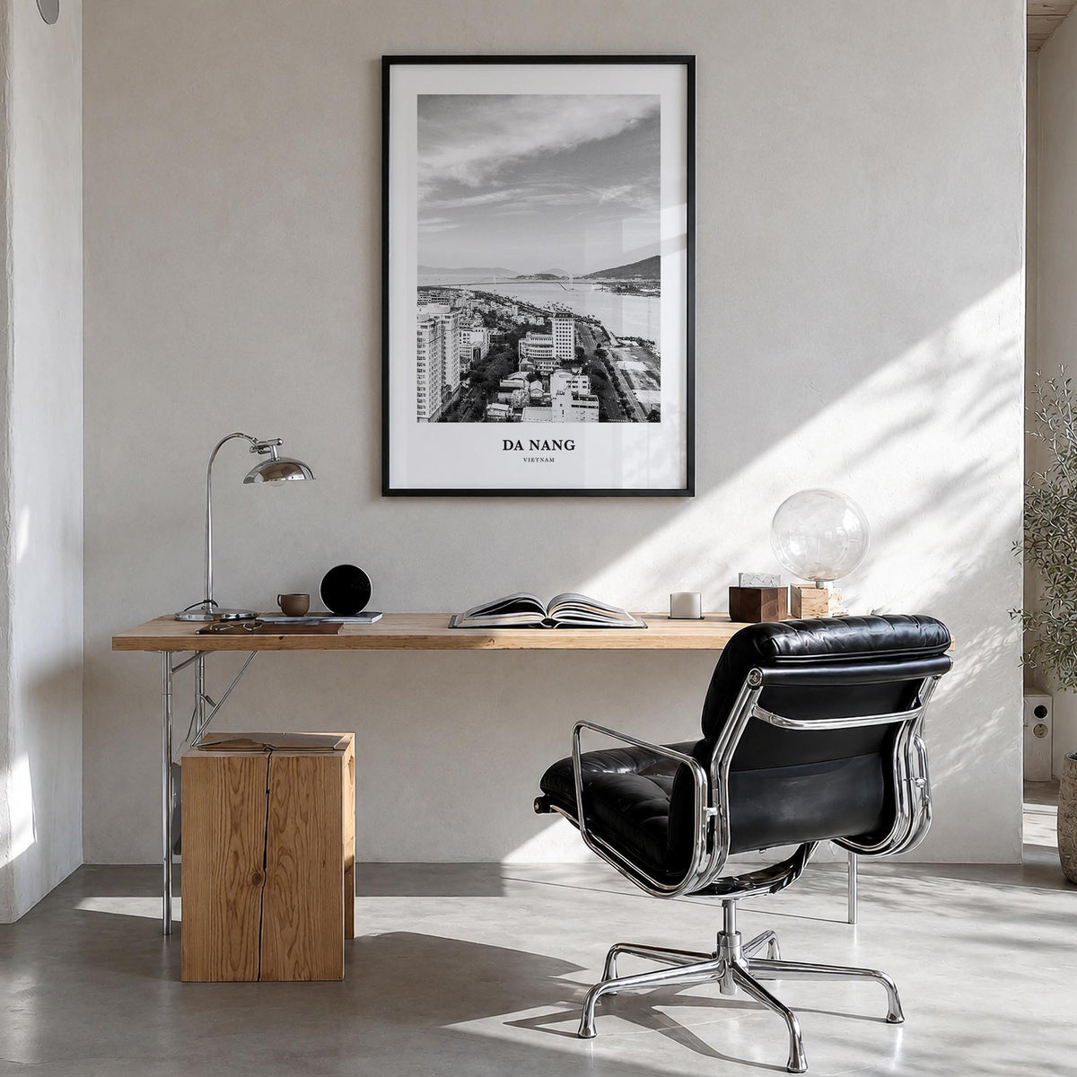 Da Nang black & white classic poster of Vietnam – vertical wall art in black wood frame, hanging on wall