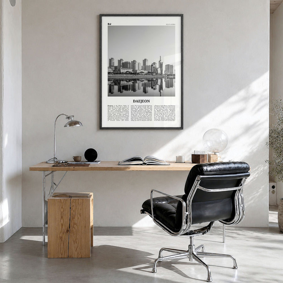 Daejeon Newspaper Poster in a black wood frame, hanging in a bright home office