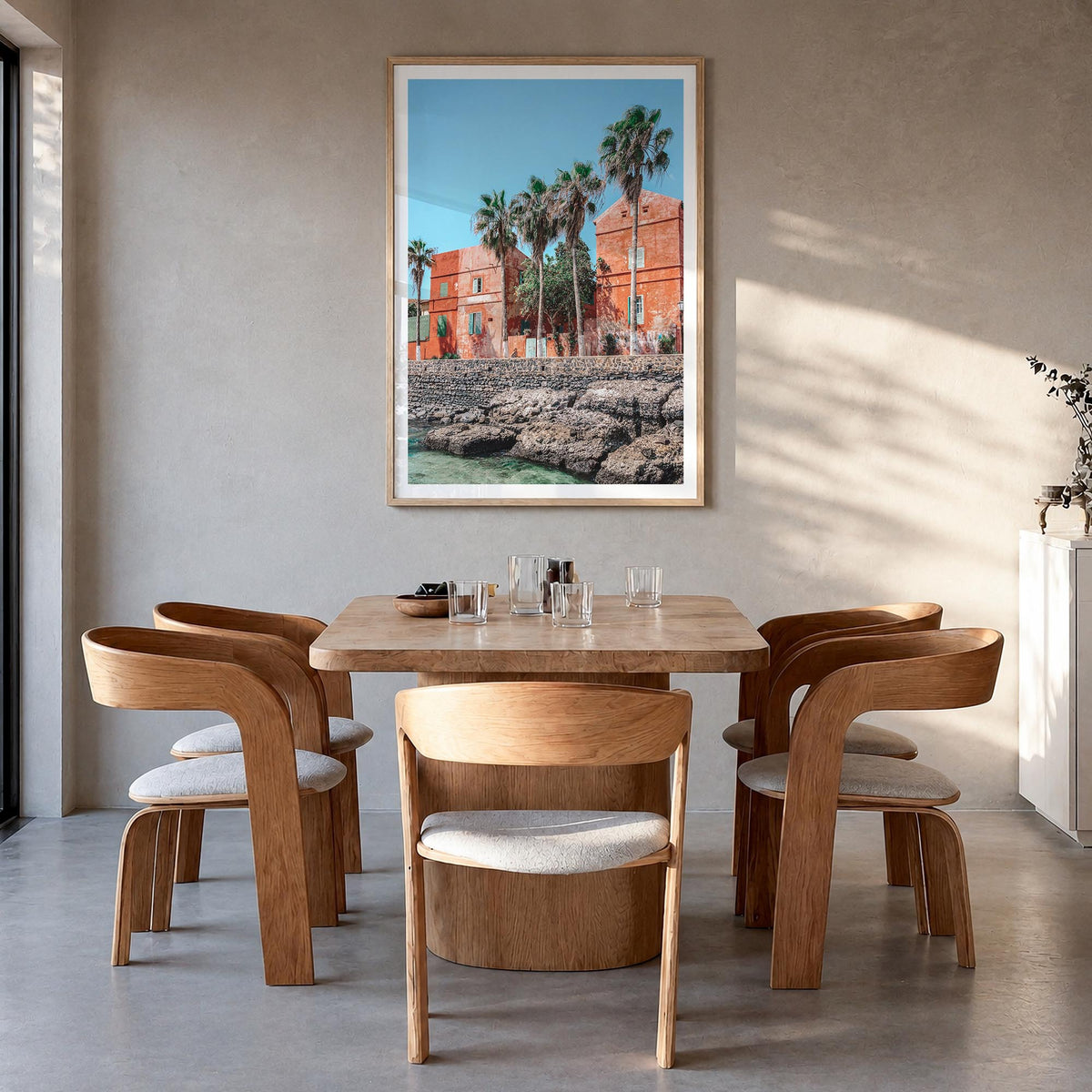 Dakar colorful photo poster of Senegal – vertical wall art in natural wood frame with white border, hanging on wall