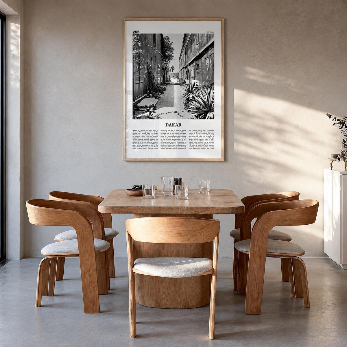 Dakar no. 1 black & white newspaper poster of Senegal – vertical wall art in natural wood frame, hanging on wall