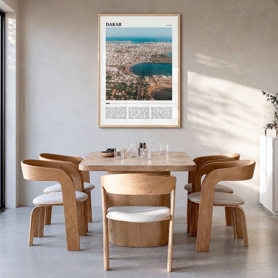 Dakar Travel Poster in a natural wood frame, hanging in a dining room