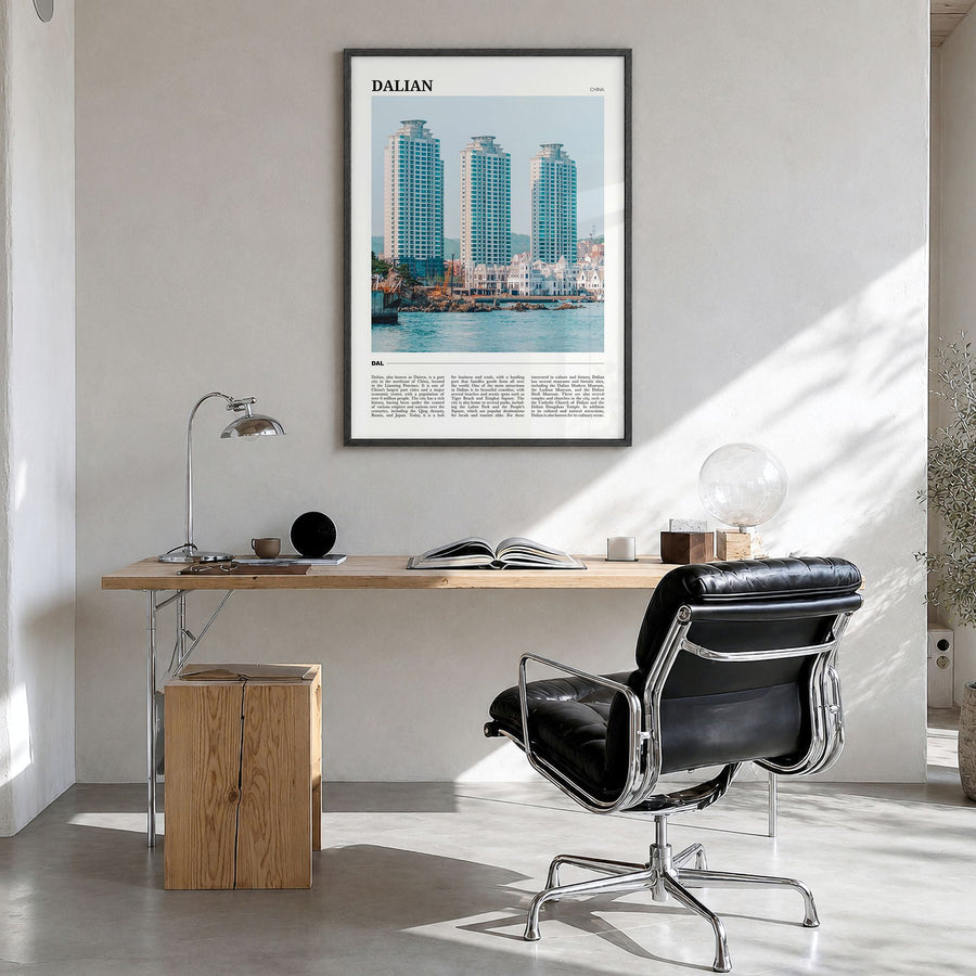 Dalian Travel Poster in a black wood frame, hanging in a bright home office