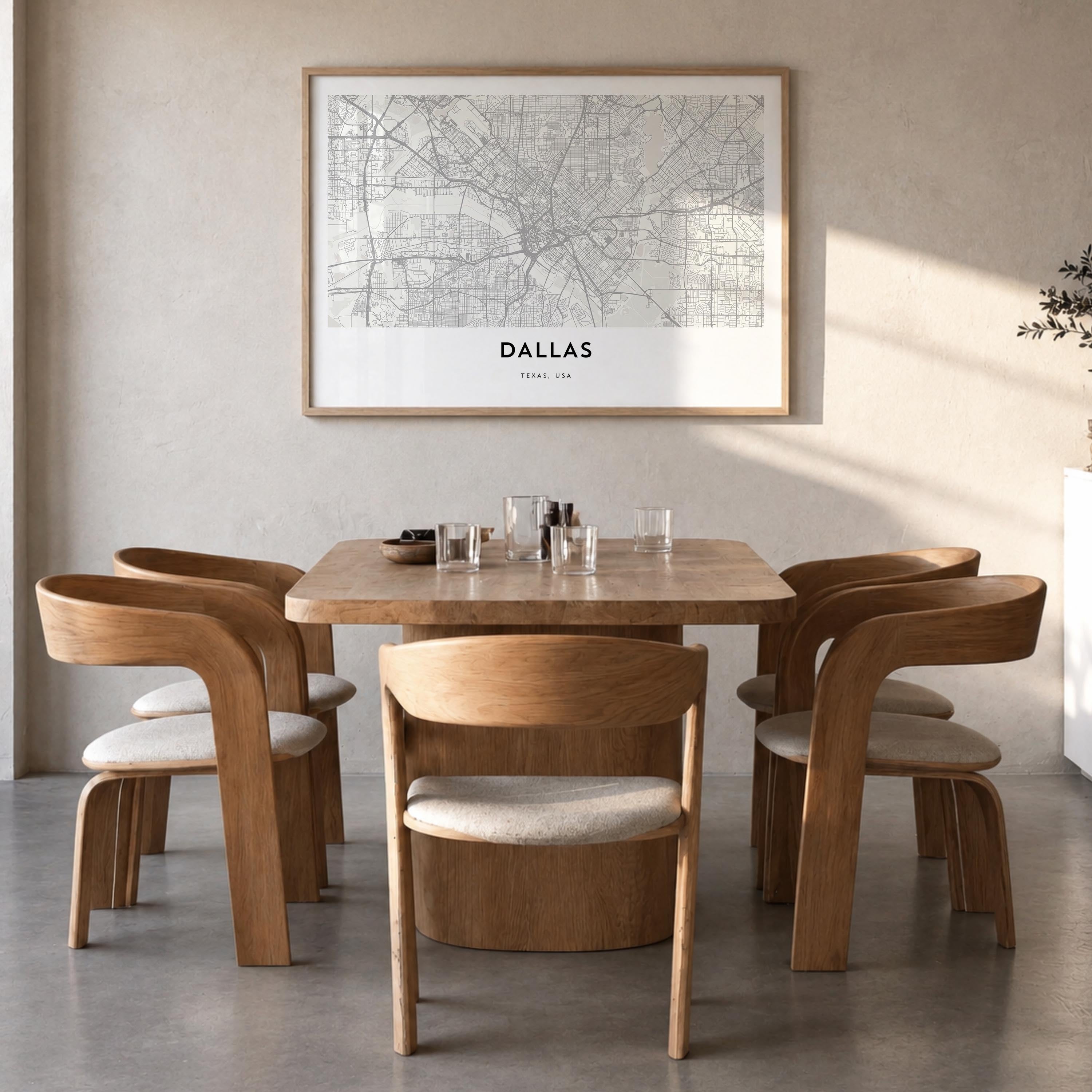 Dallas black & white map poster of Texas, USA – horizontal wall art in natural wood frame, hanging on wall