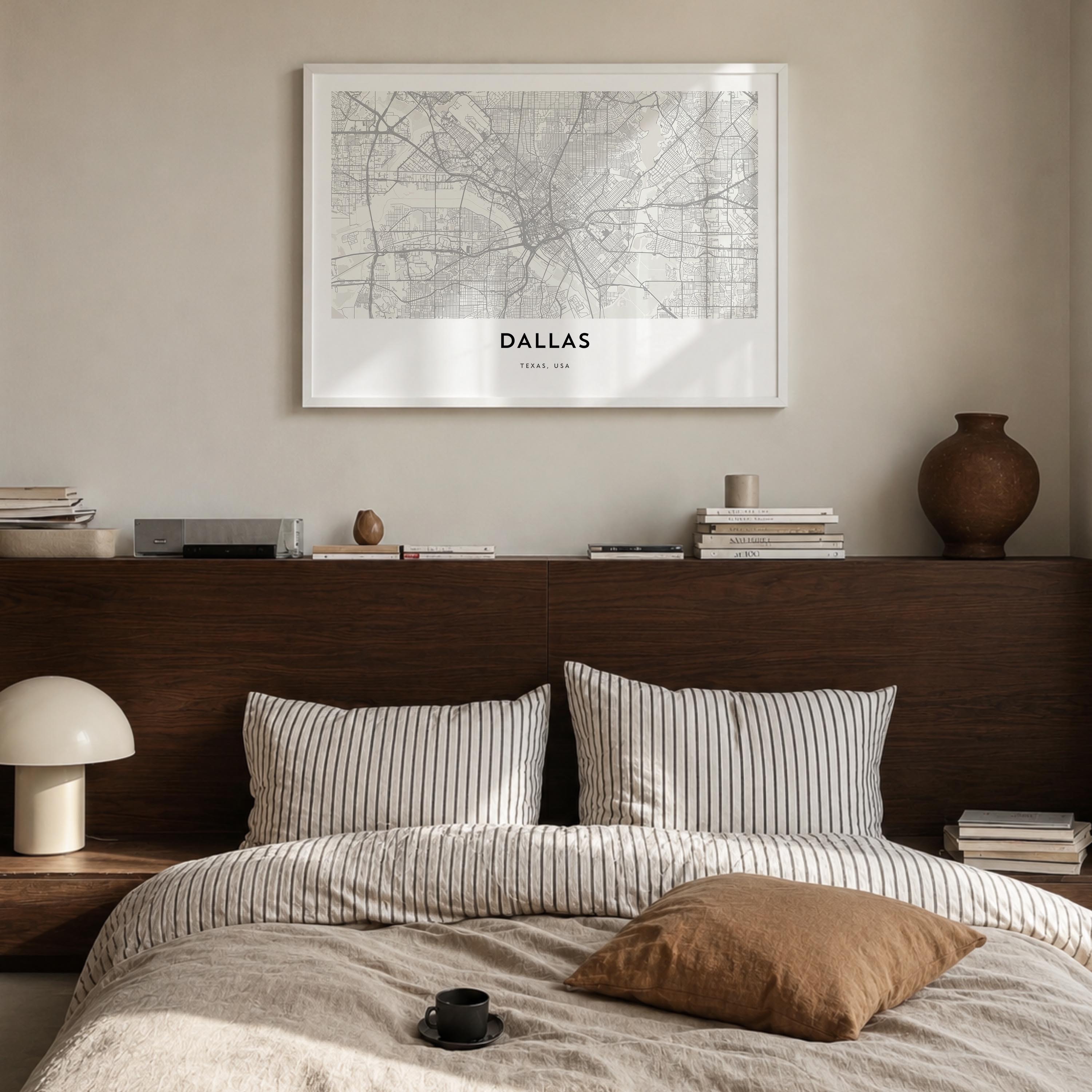 Dallas black & white map poster of Texas, USA – horizontal wall art in white wood frame, hanging on wall