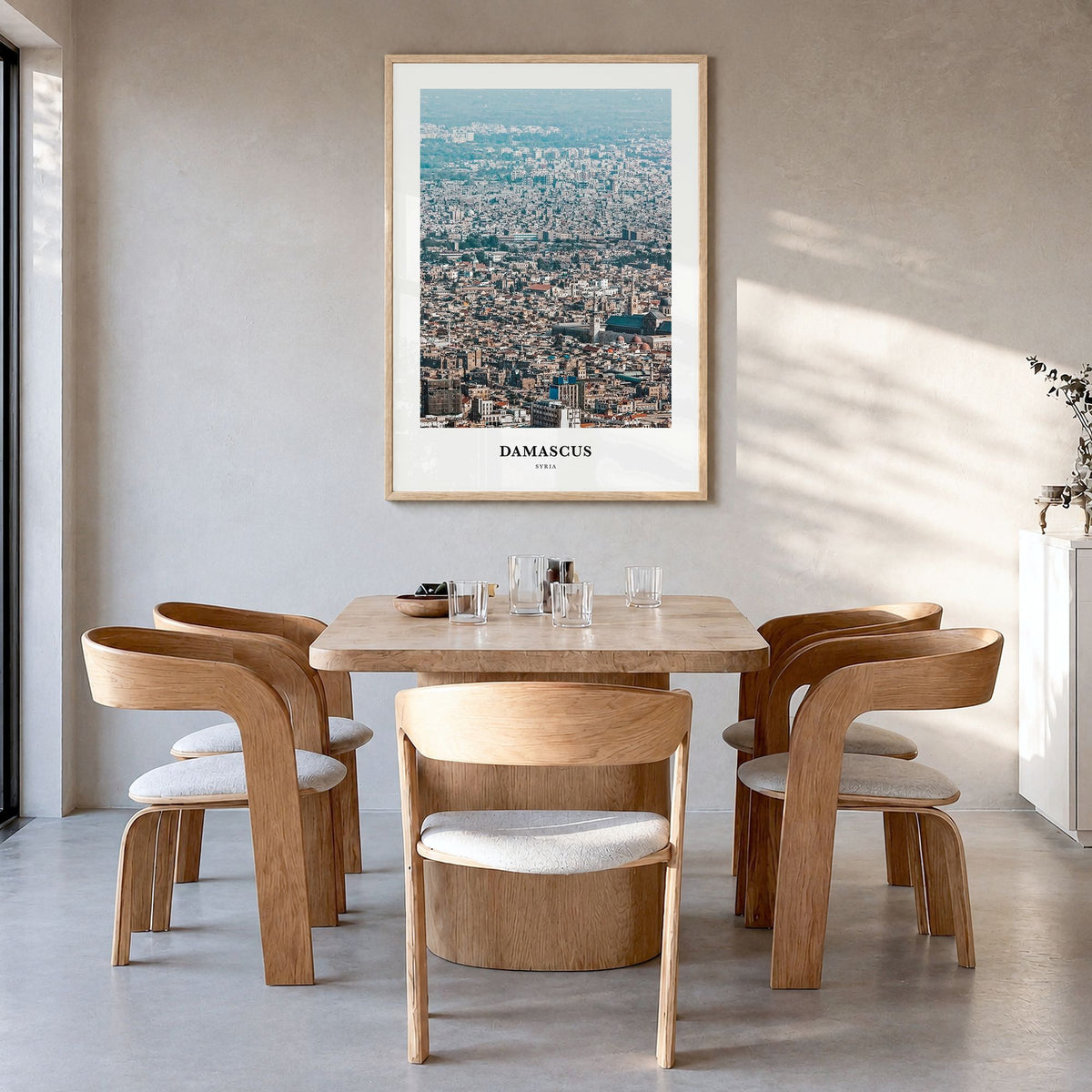 Damascus Classic Poster in a natural wood frame, hanging in a dining room