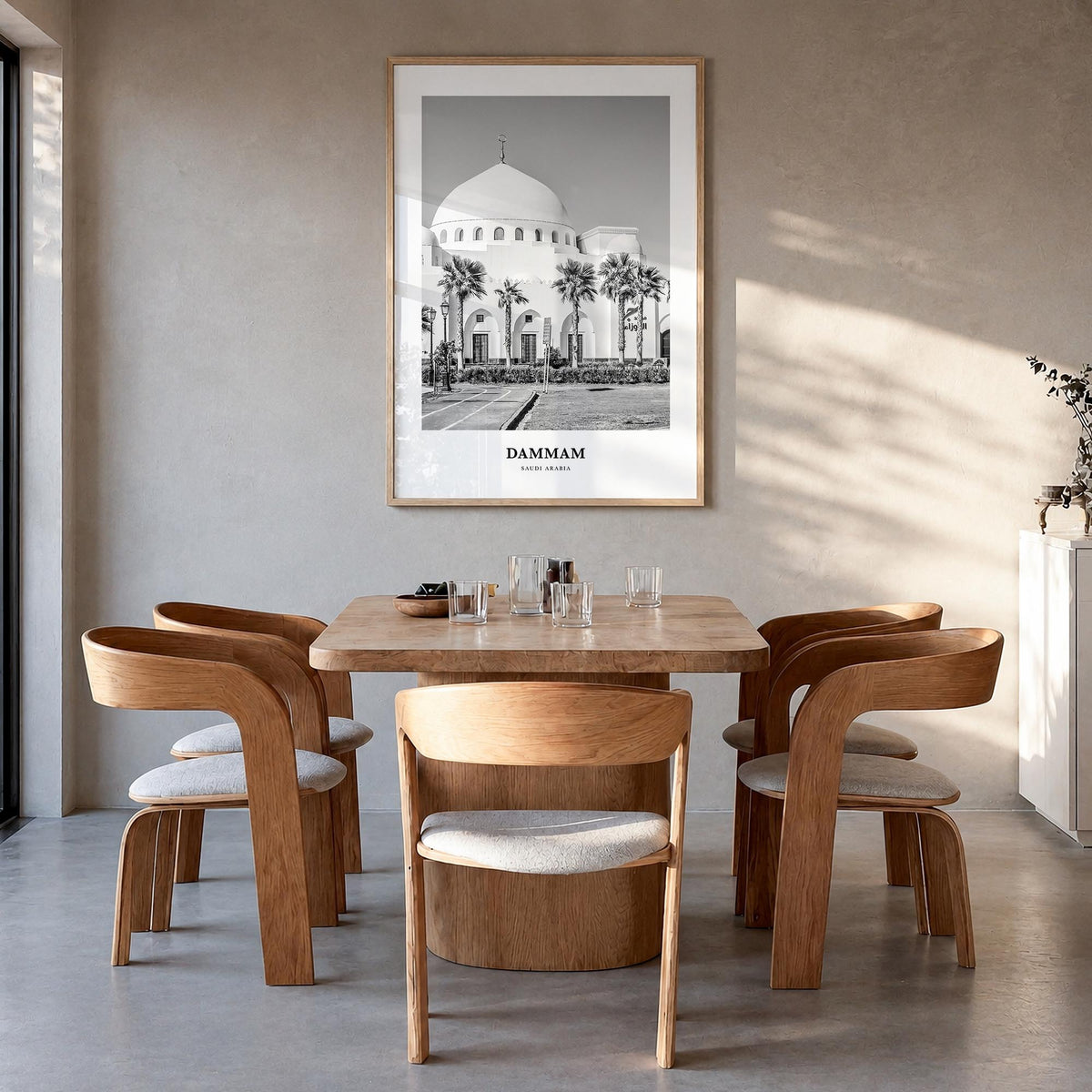 Dammam black & white classic poster of Saudi Arabia – vertical wall art in natural wood frame, hanging on wall
