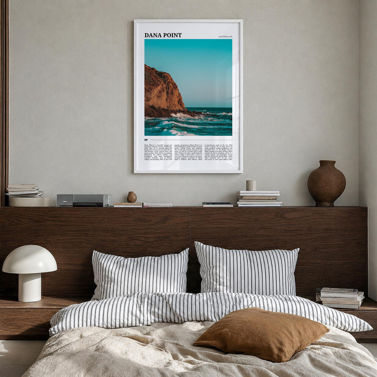 Dana Point colorful travel poster of California, USA – vertical wall art in white wood frame, hanging on wall