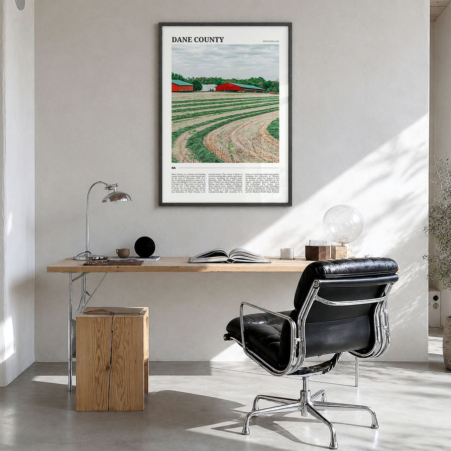 Dane County Travel Poster in a black wood frame, hanging in a bright home office