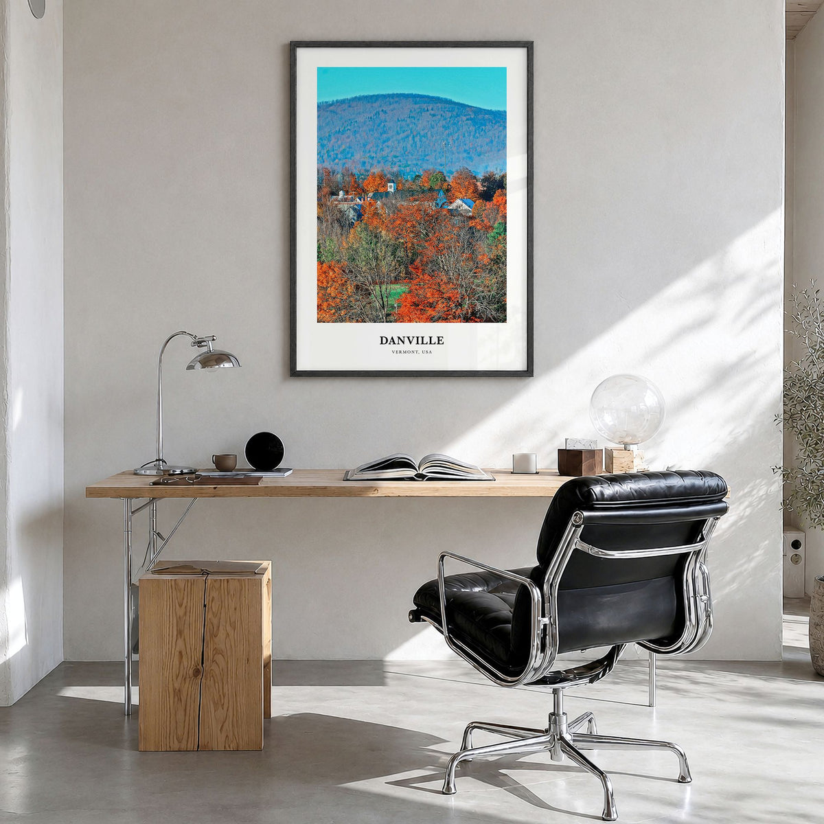 Danville, Vermont Classic Poster in a black wood frame, hanging in a bright home office