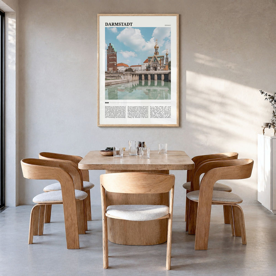 Darmstadt Travel Poster in a natural wood frame, hanging in a dining room