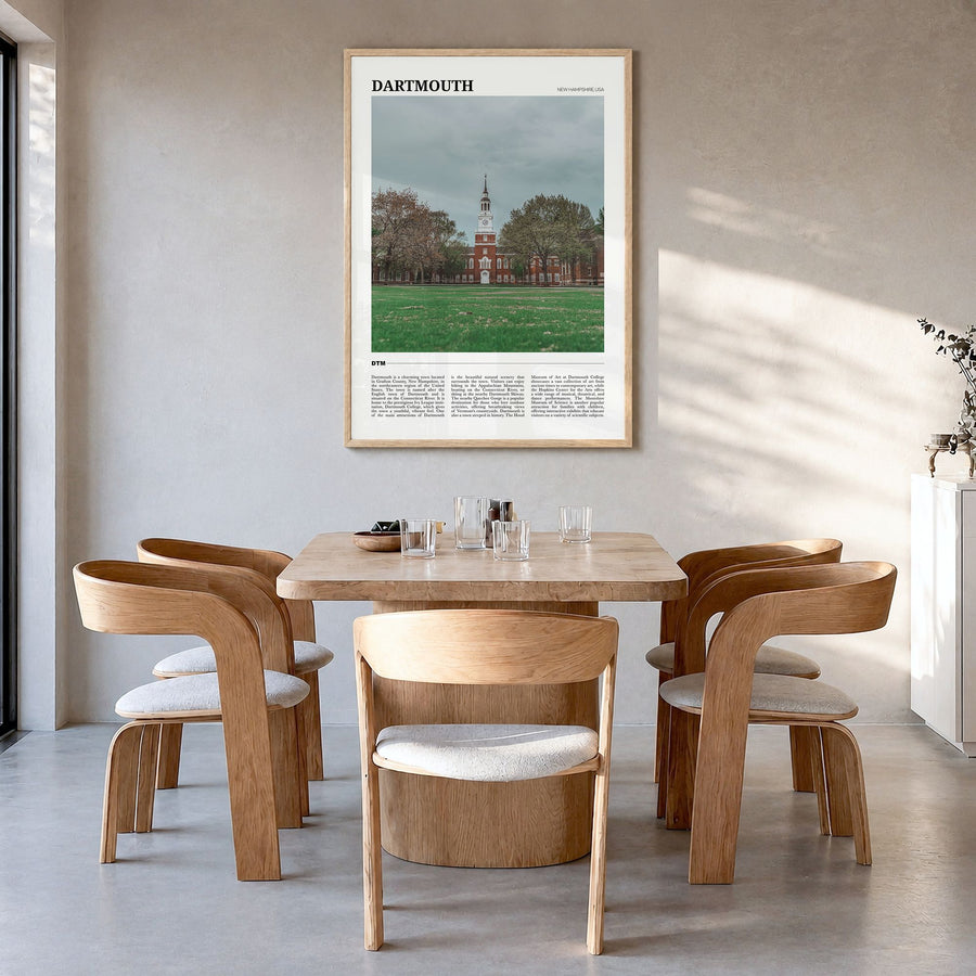 Dartmouth Travel Poster in a natural wood frame, hanging in a dining room