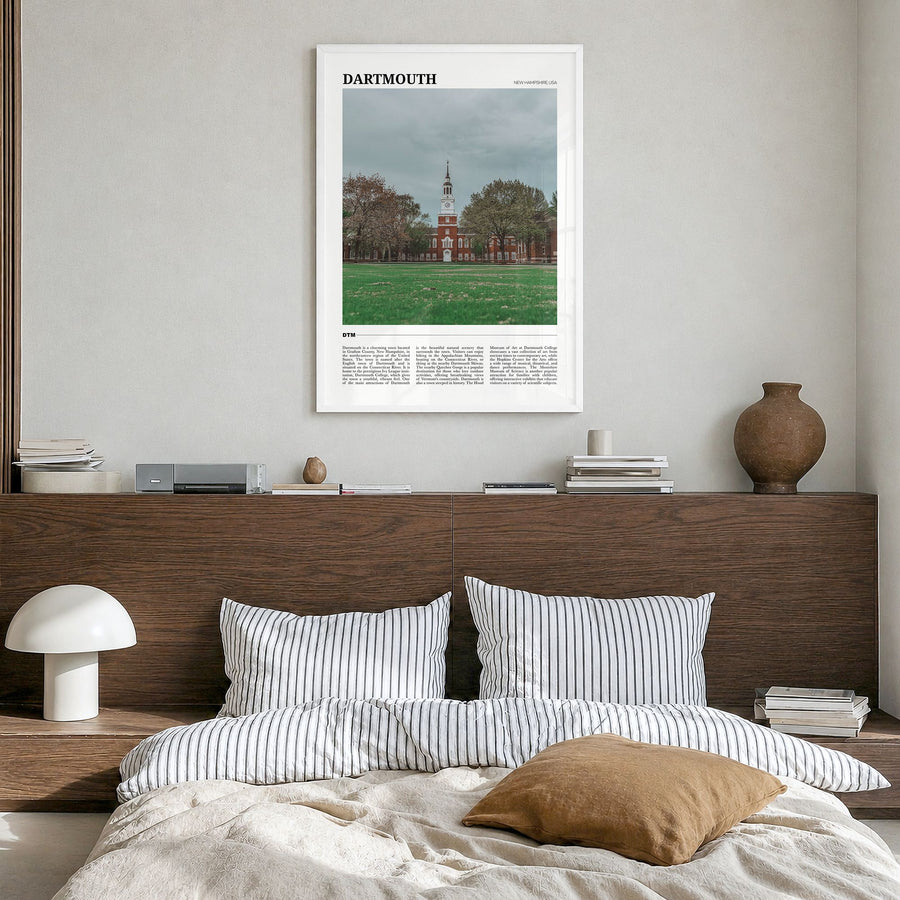 Dartmouth Travel Poster in a white wood frame, hanging in a bedroom