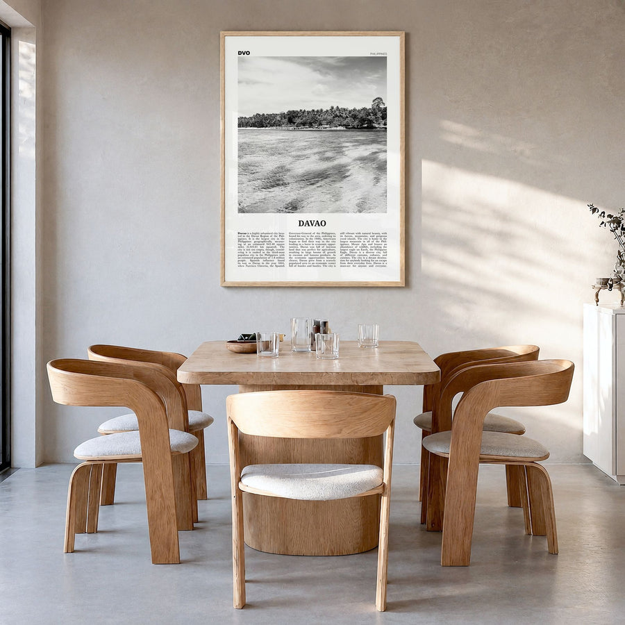 Davao Newspaper Poster in a natural wood frame, hanging in a dining room