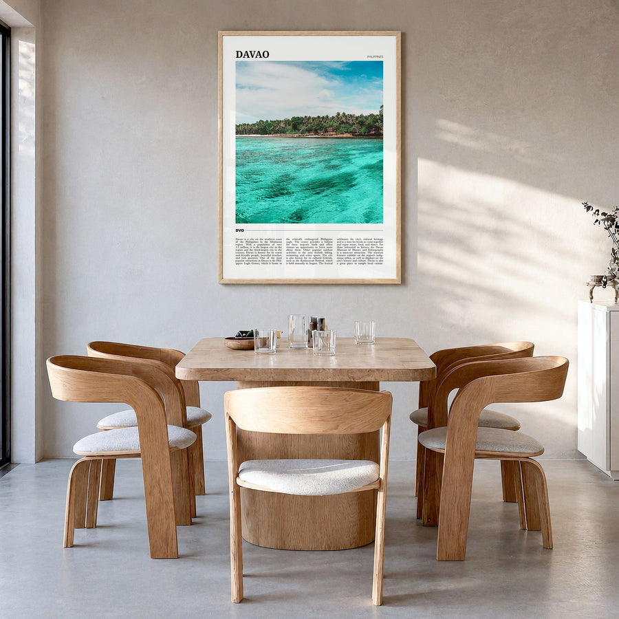 Davao Travel Poster in a natural wood frame, hanging in a dining room