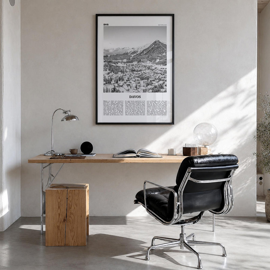 Davos black & white newspaper poster of Switzerland – vertical wall art in black wood frame, hanging on wall