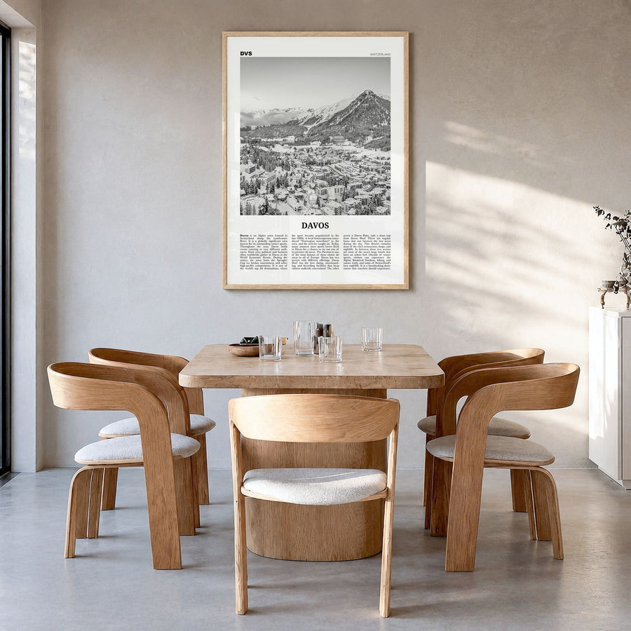 Davos Newspaper Poster in a natural wood frame, hanging in a dining room
