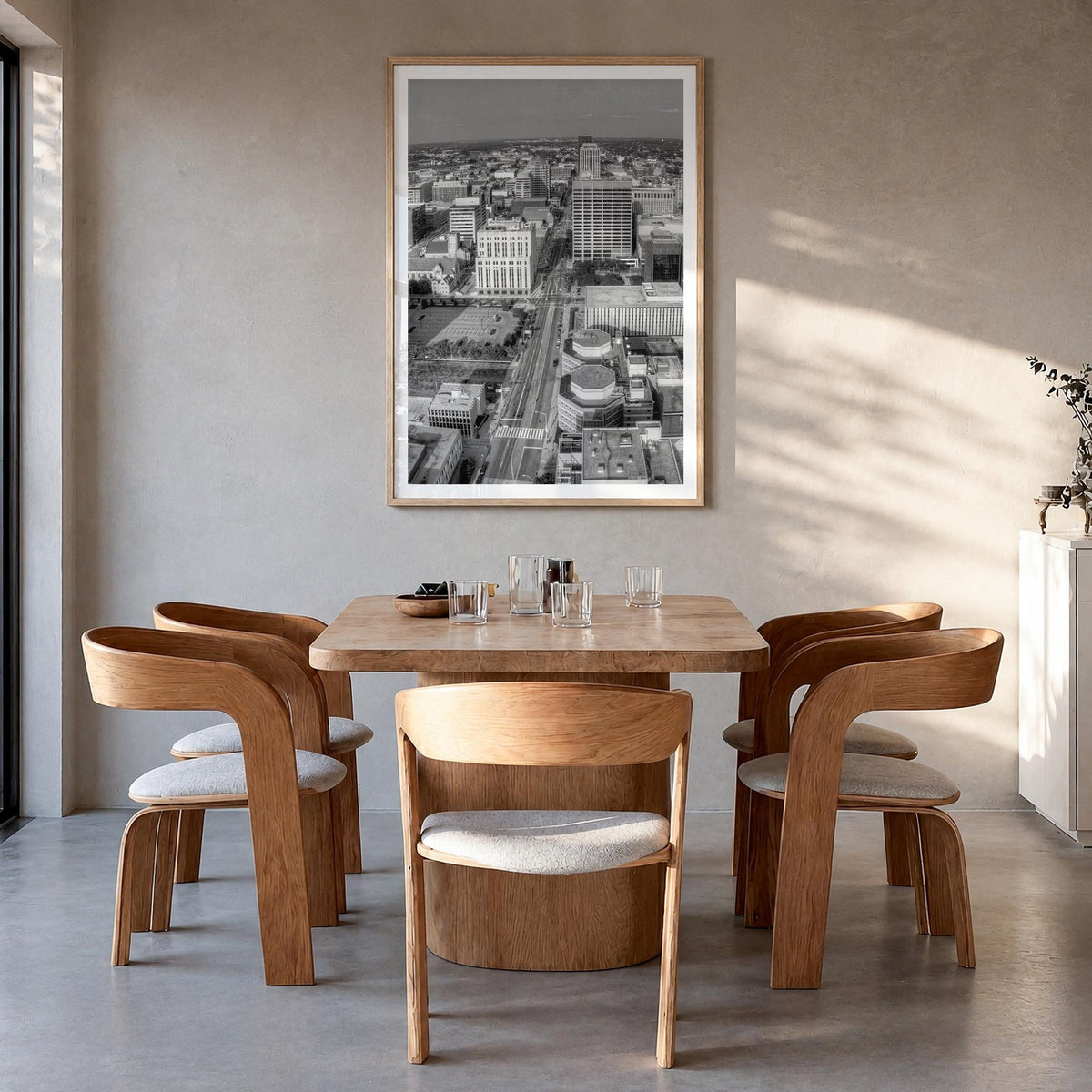 Dayton black & white photo poster of Ohio, USA – vertical wall art in natural wood frame with white border, hanging on wall
