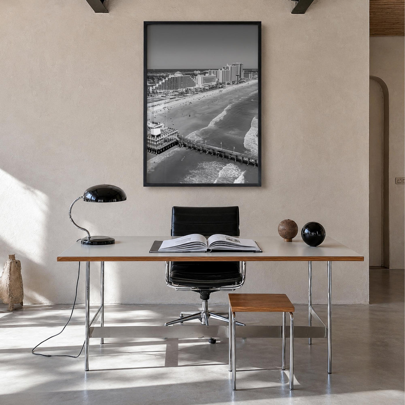 Daytona Beach black & white photo poster of Florida, USA – vertical wall art in black wood frame, hanging on wall