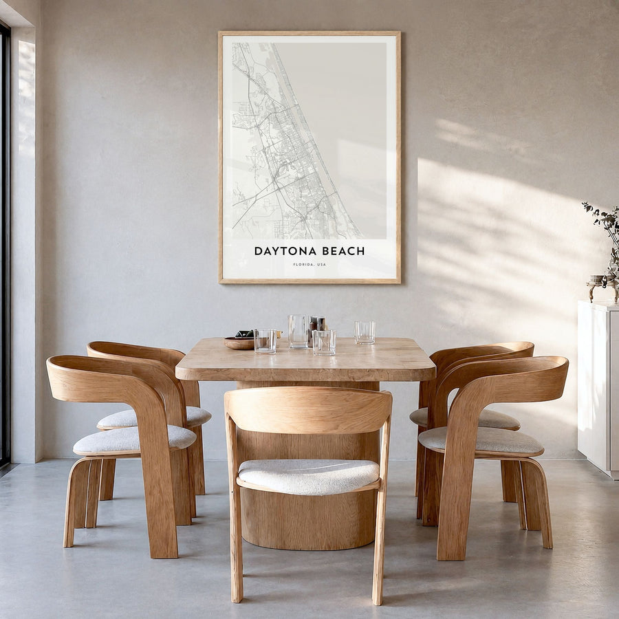 Daytona Beach Map Poster in a natural wood frame, hanging in a dining room