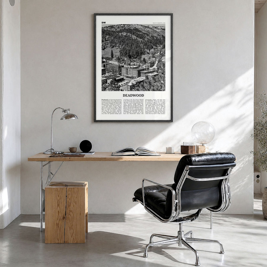Deadwood Newspaper Poster in a black wood frame, hanging in a bright home office