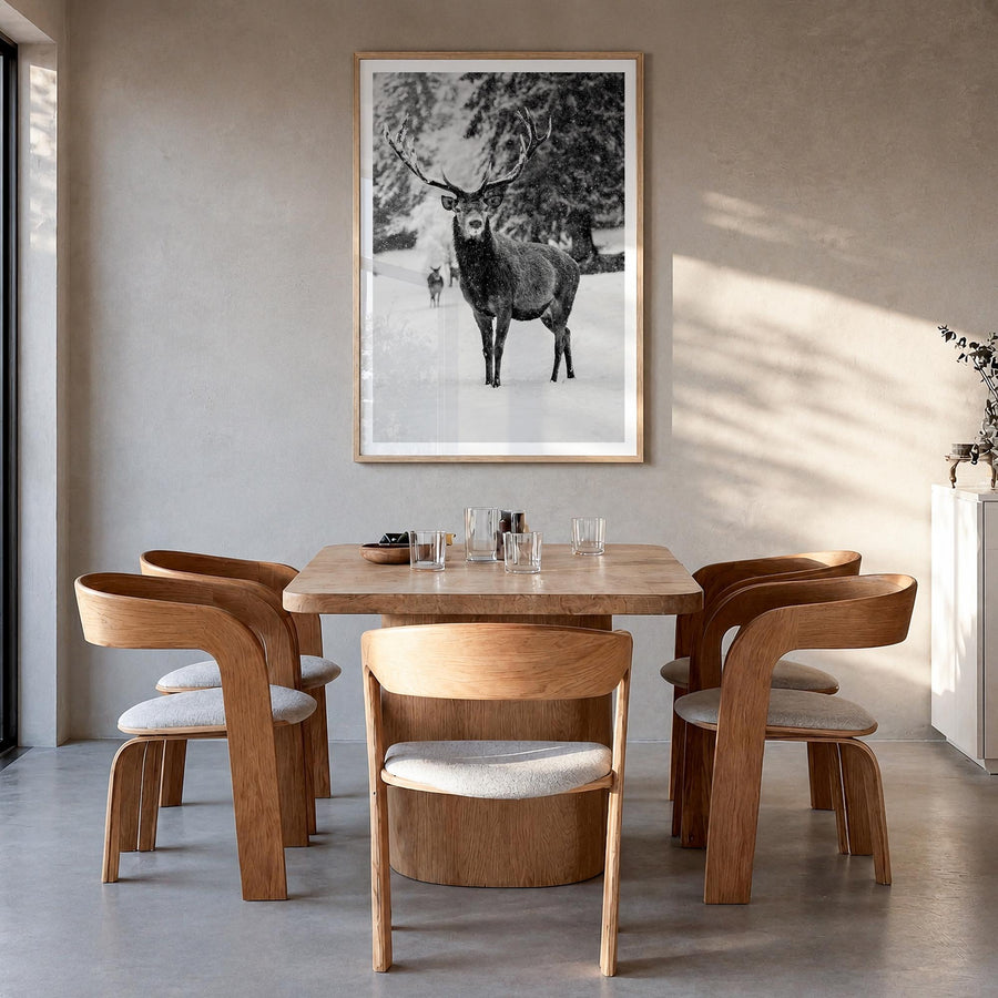 Deer black & white photo poster – vertical wall art in natural wood frame with white border, hanging on wall