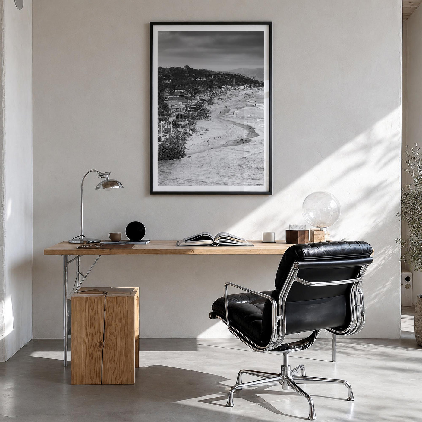 Del Mar black & white photo poster of California, USA – vertical wall art in black wood frame with white border, hanging on w