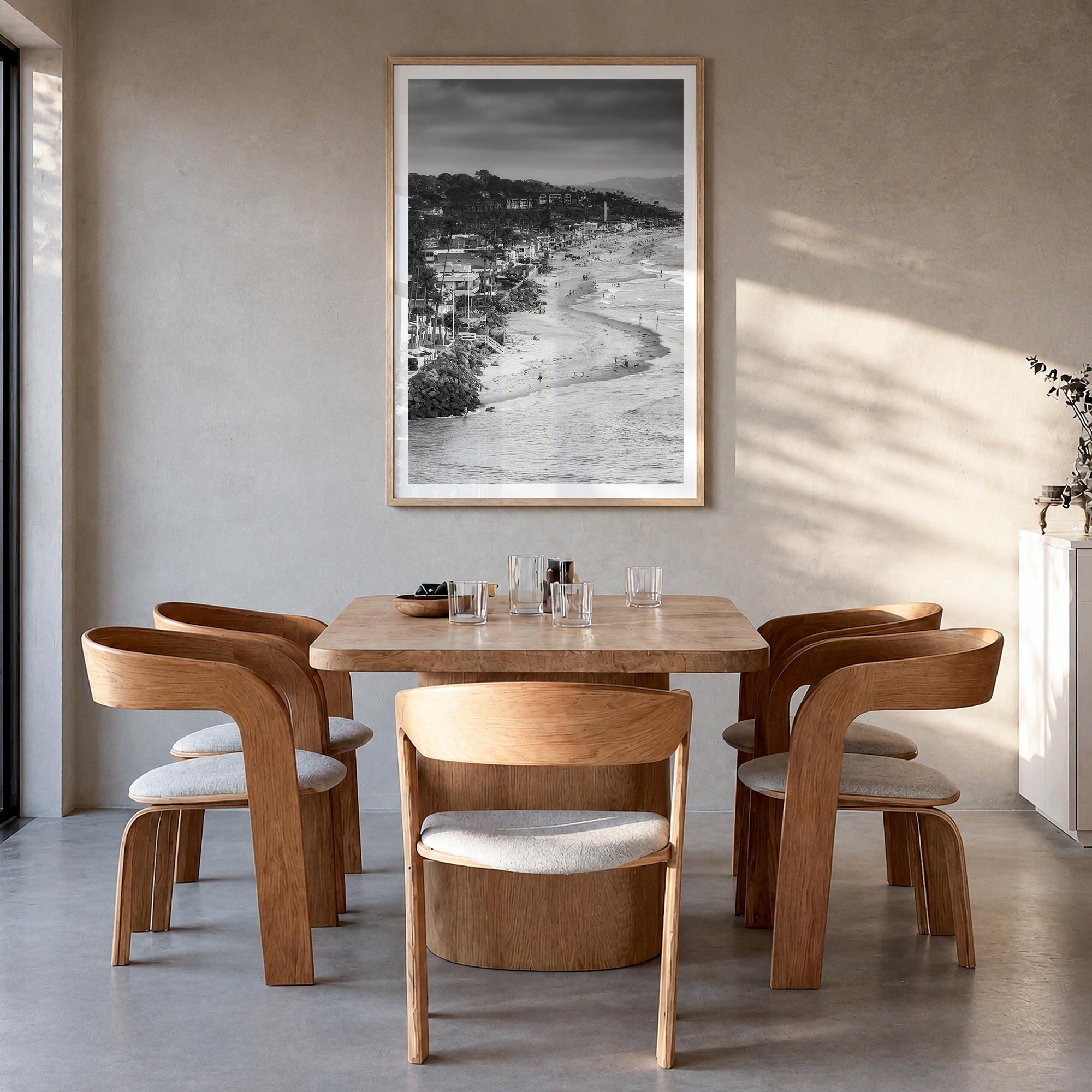 Del Mar black & white photo poster of California, USA – vertical wall art in natural wood frame with white border, hanging on