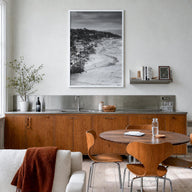Del Mar black & white photo poster of California, USA – vertical wall art in white wood frame, hanging on wall