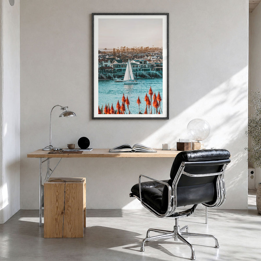 Del Mar Photo No 1 Poster in a black wood frame, hanging in a bright home office, white border