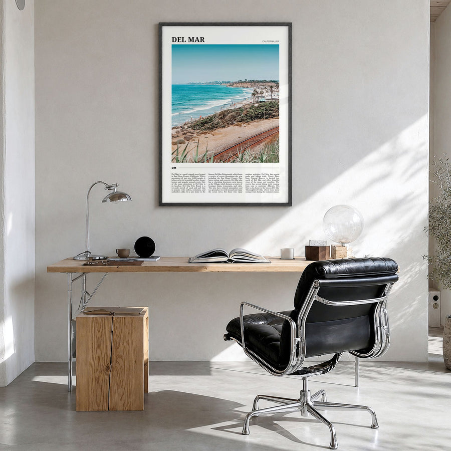 Del Mar Travel Poster in a black wood frame, hanging in a bright home office