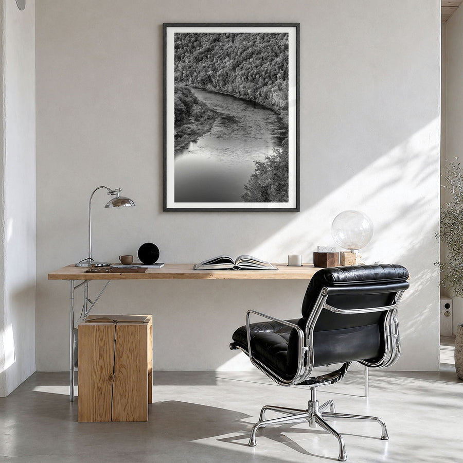 Delaware Photo Poster in a black wood frame, hanging in a bright home office, white border