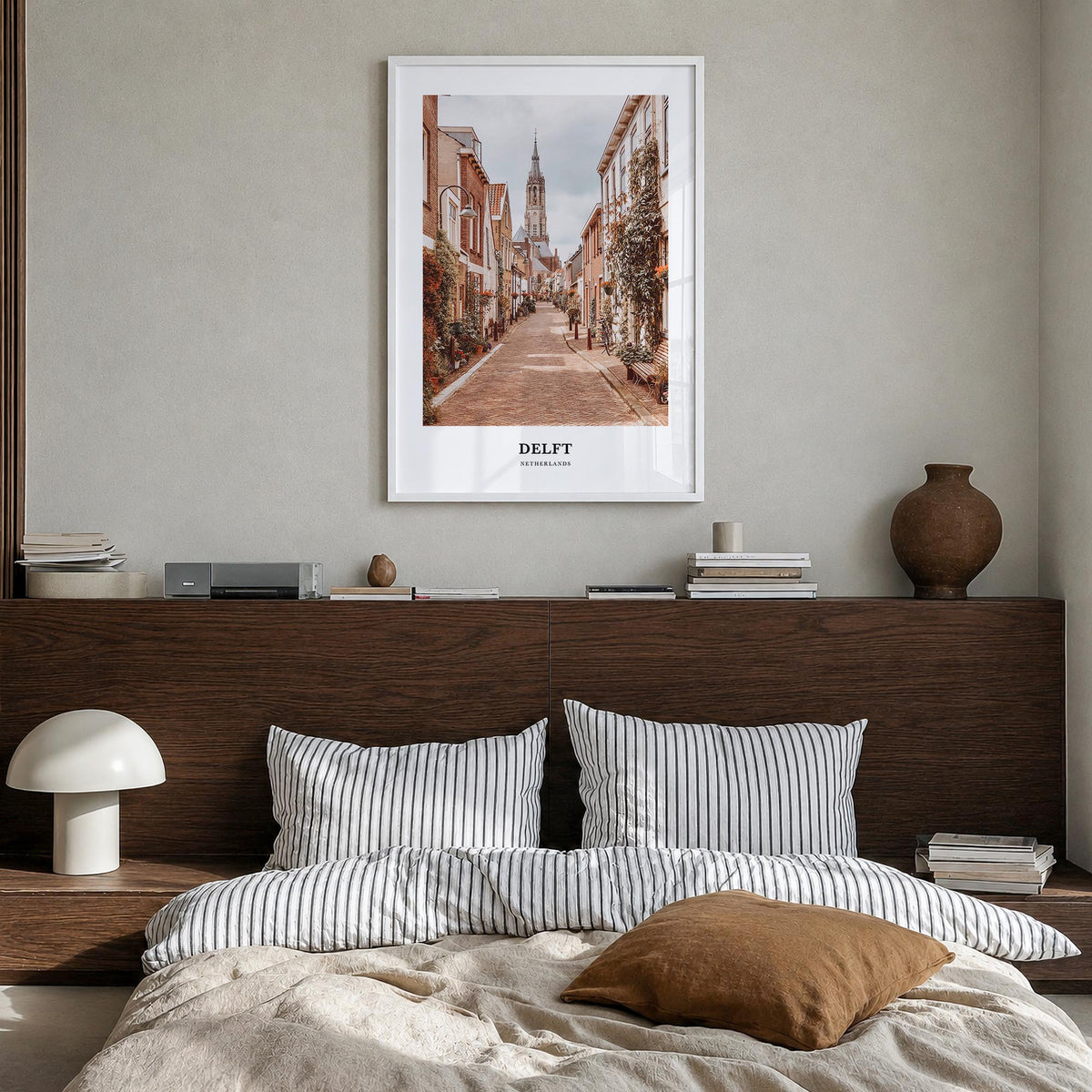Delft colorful classic poster of Netherlands – vertical wall art in white wood frame, hanging on wall