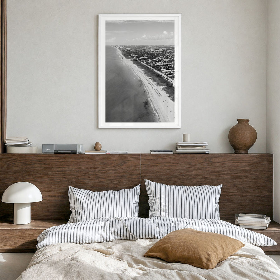 Delray Beach Photo Poster in a white wood frame, hanging in a bedroom, white border