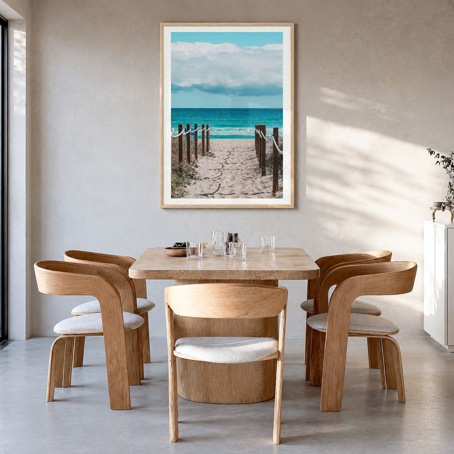 Delray Beach Photo Poster in a natural wood frame, hanging in a dining room, white border