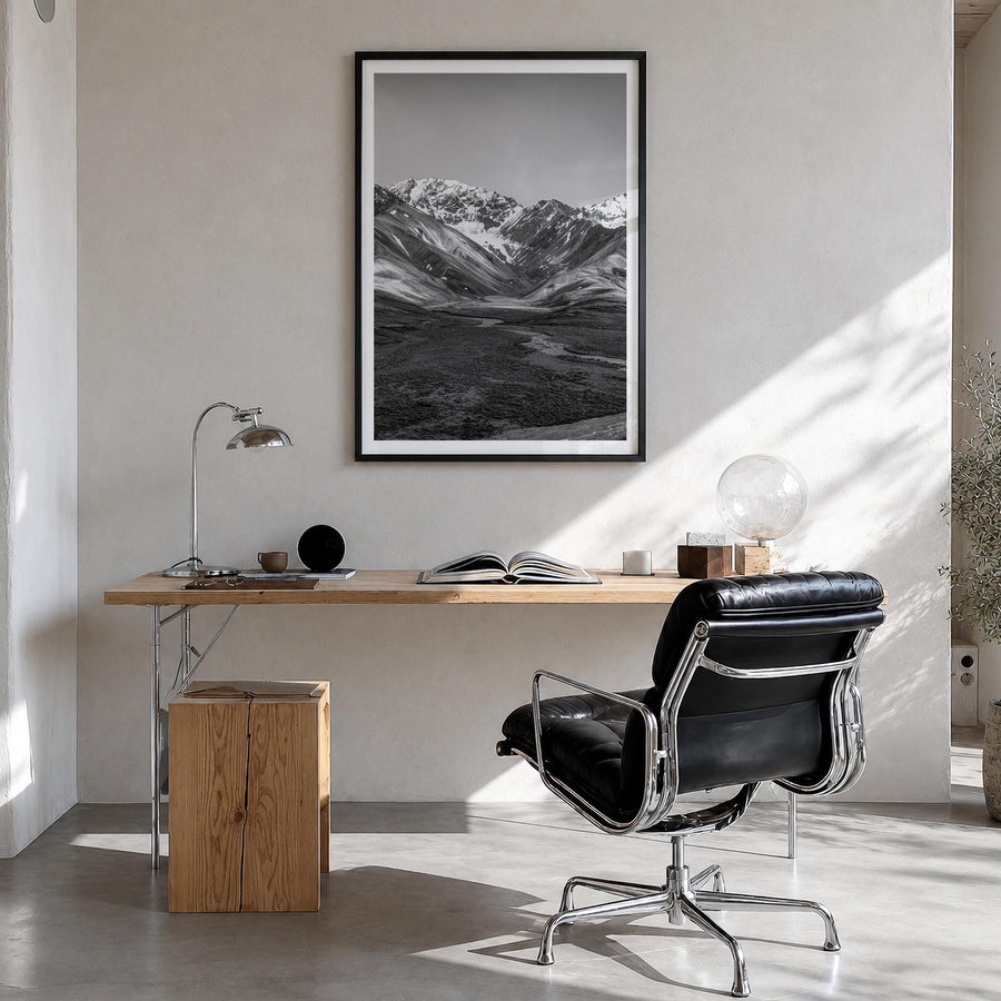 Denali black & white photo poster of Alaska, USA – vertical wall art in black wood frame with white border, hanging on wall
