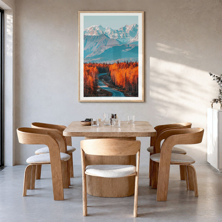 Denali Photo Poster in a natural wood frame, hanging in a dining room, white border