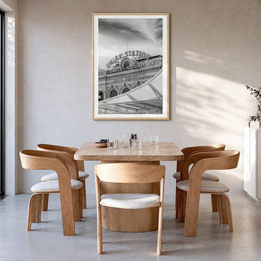 Denver Photo No 2 Poster in a natural wood frame, hanging in a dining room, white border