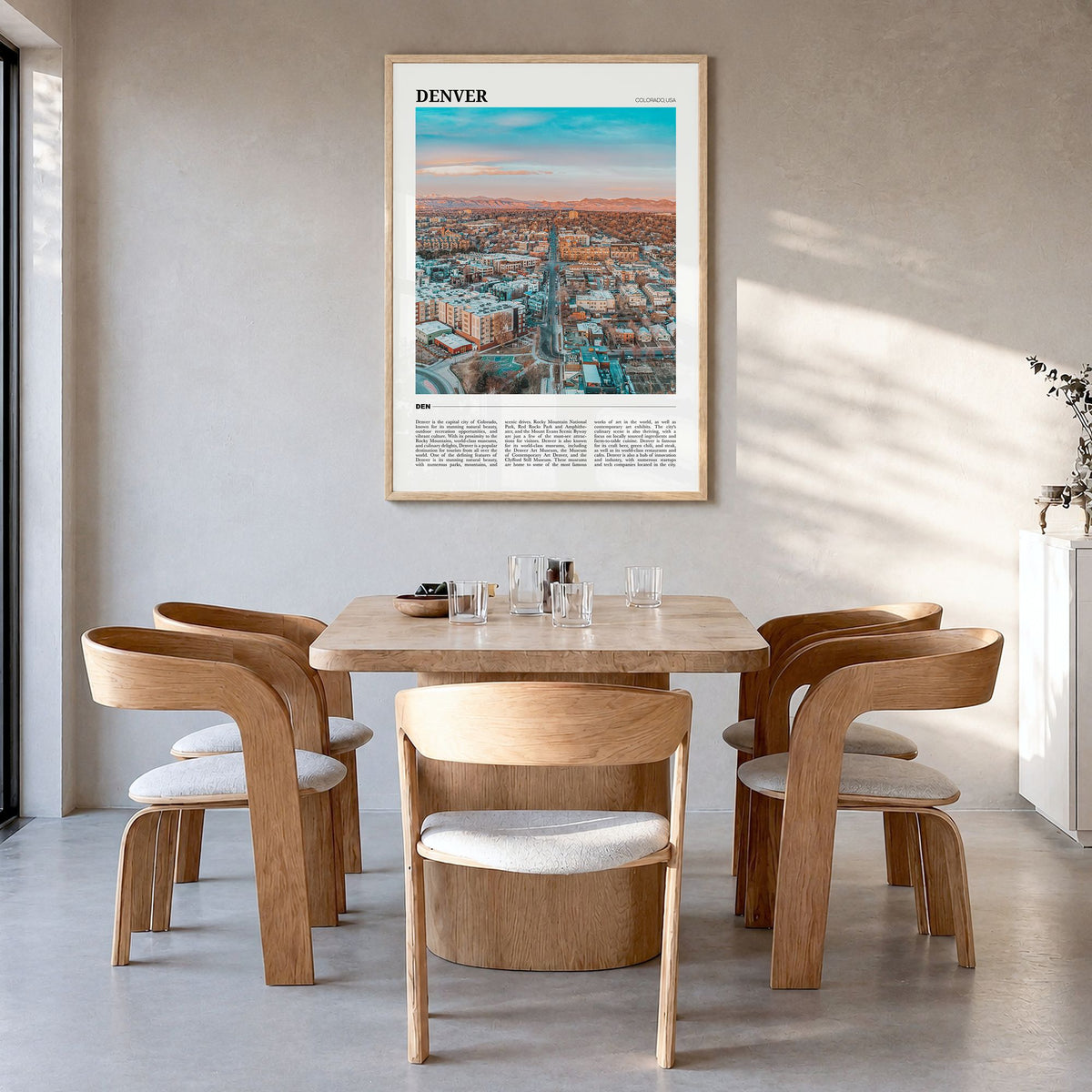 Denver Travel No 1 Poster in a natural wood frame, hanging in a dining room